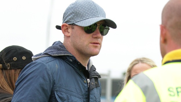 Wayne Rooney is turned away by security guard