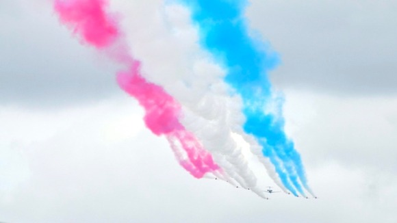 Red Arrows' signature tail smoke.