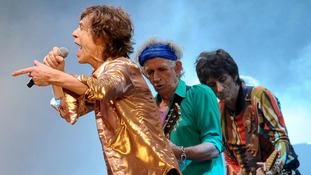Mick Jagger, Keith Richards and Ronnie Wood from the Rolling Stones perform on the Pyramid Stage
