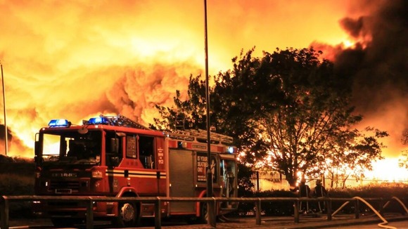 The fire service says it has received more than 300 999 calls about the blaze.