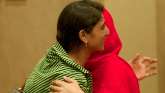 Malala Yousufzai (right) and Shazia Ramzan meet for the first time since the Taliban attack in Pakistan.