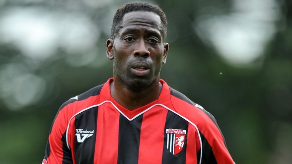 Former Gillingham player Mark McCammon reported a racist and threatening message to police.