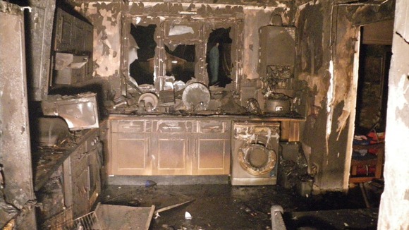 Home damaged by a fridge freezer fire