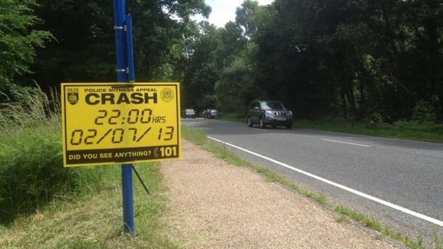 Sign appealing for witnesses of crash