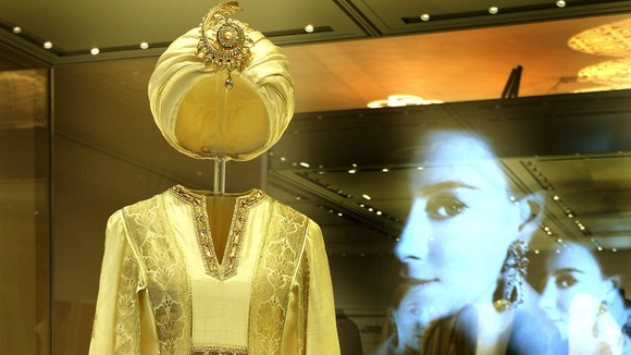 A dress and turban worn by Princess Margaret on the island of Mustique in 1976