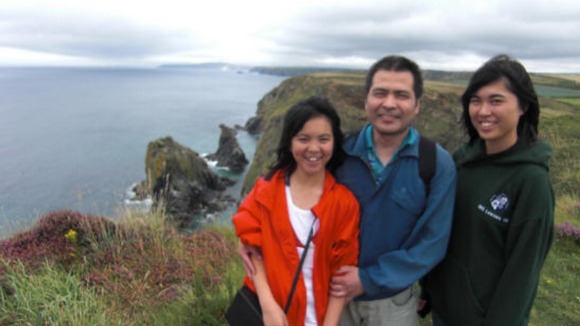 Jifeng Ding with his daughters Xing (right) and Alice (left)