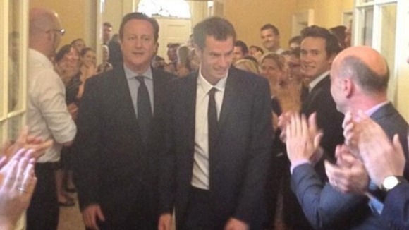 Downing Street staff applauded Andy Murray as he arrived at Number 10