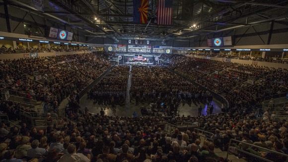 Mourners wait for the start of the memorial service in Prescott Valley, Arizona
