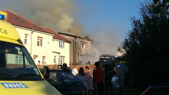 Firefighter tackling fire