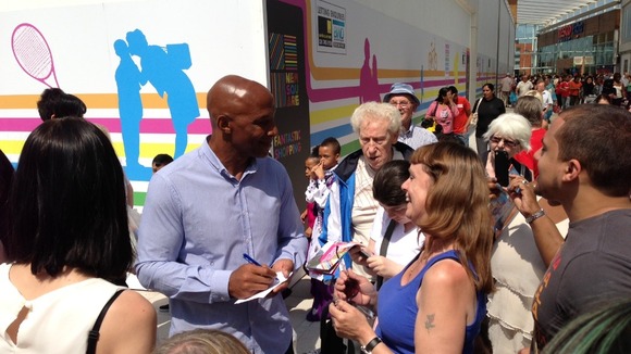 Cyrille Regis meeting fans at the opening of the New Square shopping centre.