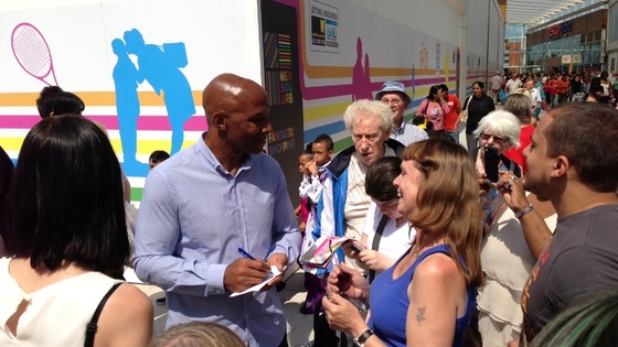 Cyrille Regis meeting fans at the opening of the New Square shopping centre.