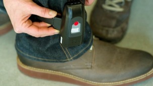 An offender wears an electronic tag
