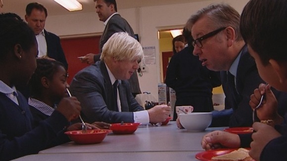 London Mayor Boris Johnson and Education Secretary Michael Gove join children for a bite to eat.