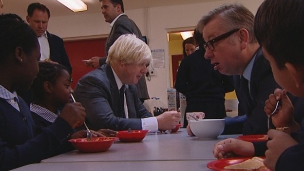 London Mayor Boris Johnson and Education Secretary Michael Gove join children for a bite to eat.