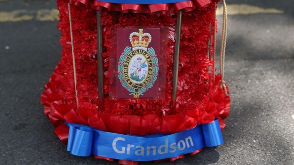 A floral tribute from Fusilier Lee Rigby's grandparents during his funeral service at Bury Parish Church.