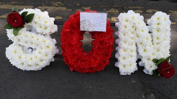 A floral tribute from Fusilier Lee Rigby's mother Lyn and his stepfather Ian.