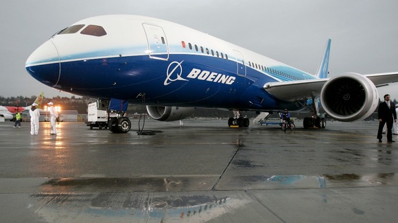 The Boeing 787 Dreamliner sits on the tarmac after its maiden flight.