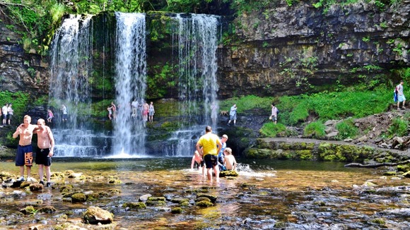People stood in waterfall