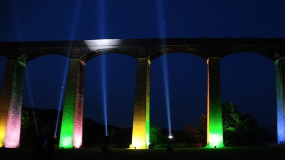 Aquaduct illuminated at night