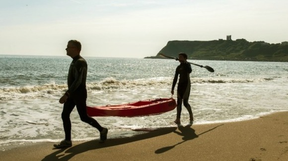 Rob Fewster-Noble and his son Adam (aged 13) on a beach in Scarborough, North Yorkshire.