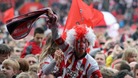 A young Southampton fan celebrates promotion to the Premier League