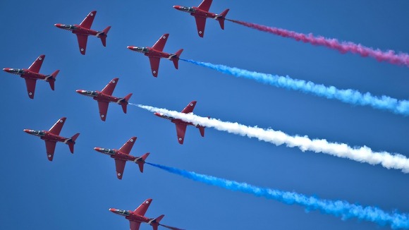 Royal Air Force Red Arrows Display Team perform at RAF Fairford, Wiltshire