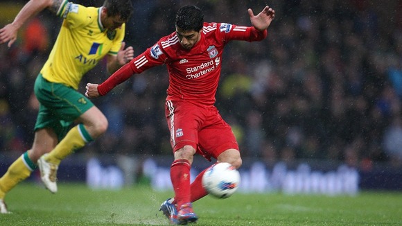 Suarez completes hat-trick