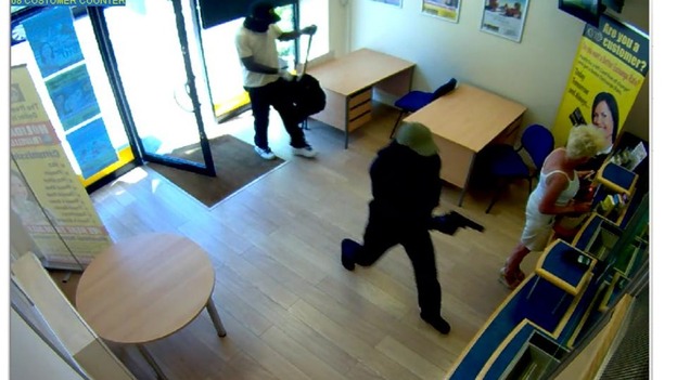 Suspects enter Western Union shop