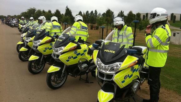 Police motorcyclists arrive at National Memorial Arboretum