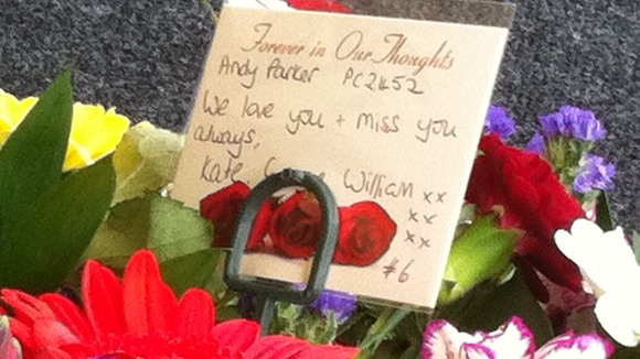 Flowers in memory of a fallen police officers