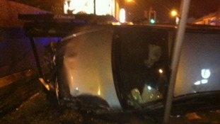 Car on its side
