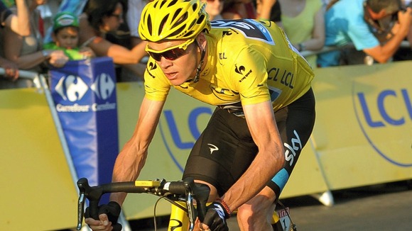 Chris Froome rides through Paris during the final stage of the Tour de France.