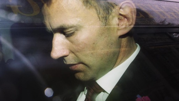 ritain's Secretary for Culture, Jeremy Hunt, is driven from the Department of Culture, Media and Sport in central London April 25, 2012