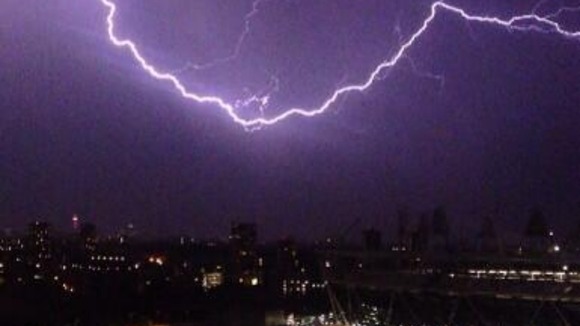 Lightning strikes over the Olympic Stadium.