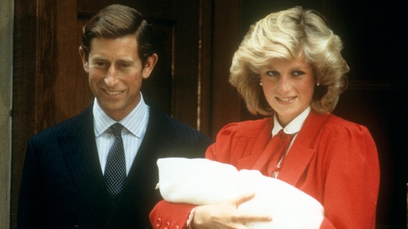 Prince Charles and Princess Diana introduce Prince Harry to the world.