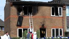 Emergency services attend the scene of a house fire in Buxton, Derbyshire, in which two young children died.