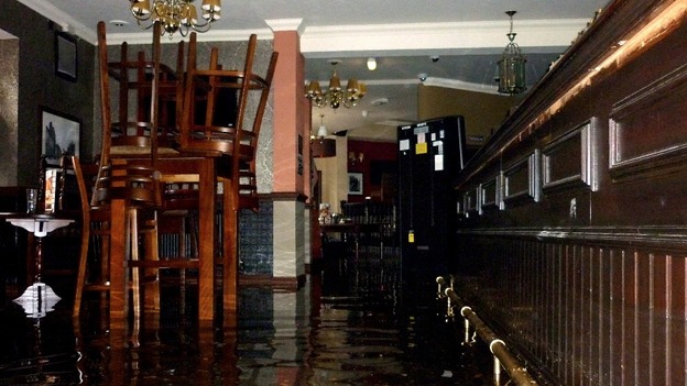 The flooded interior of The Grosvenor pub in Nottingham as a sudden flash flood left a road side pub flooded with rainwater.