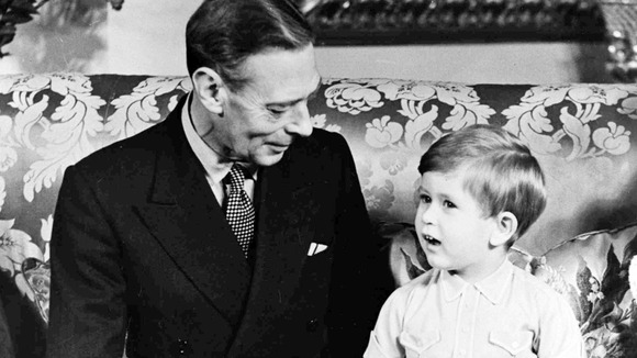 King George VI pictured with Prince Charles on his third birthday in November 1951.