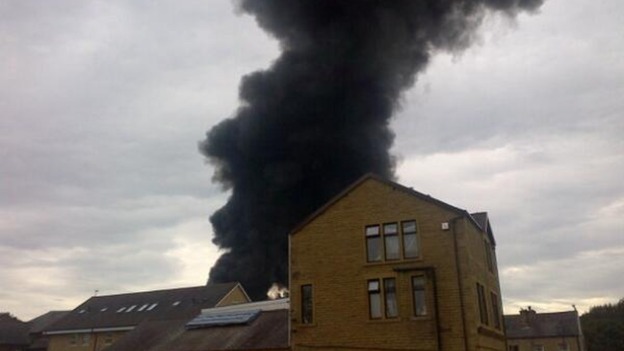 Smoke behind building