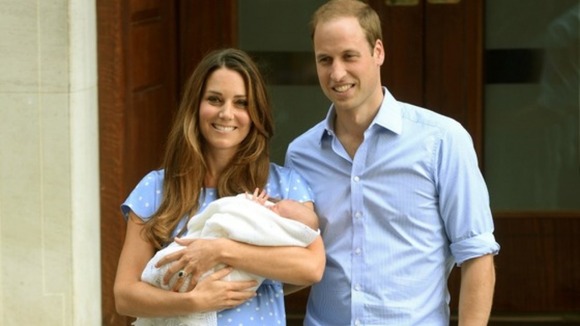William and Kate hold their newborn Prince outside the Lindo Wing.