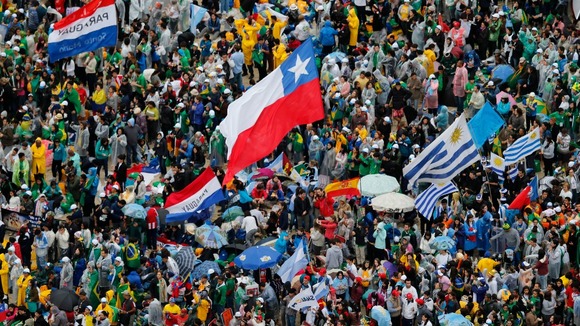 The crowd waits for Pope Francis' arrival on Copacabana beach in Rio de Janeiro.