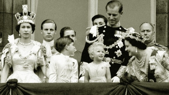 The Queen Prince Charles, Princess Anne, the Duke of Edinburgh, the Queen Mother on the balcony of Buckingham Palace.