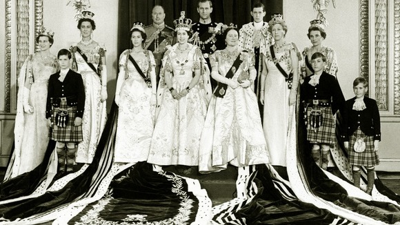 The newly crowned Queen at Buckingham Palace with other members of the Royal family.