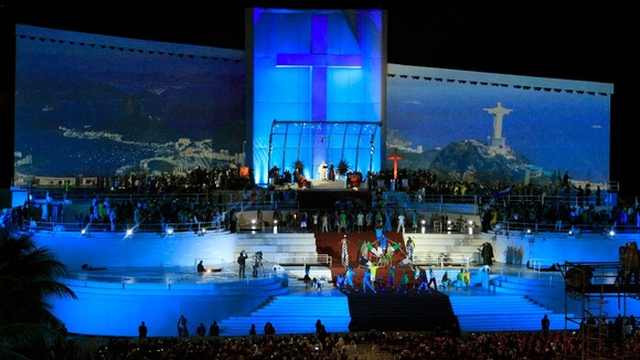 Pope Francis stands on the huge stage while presiding the Catholic Church's World Day of Youth at Copacabana beach.