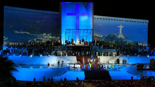 Pope Francis stands on the huge stage while presiding the Catholic Church's World Day of Youth at Copacabana beach.