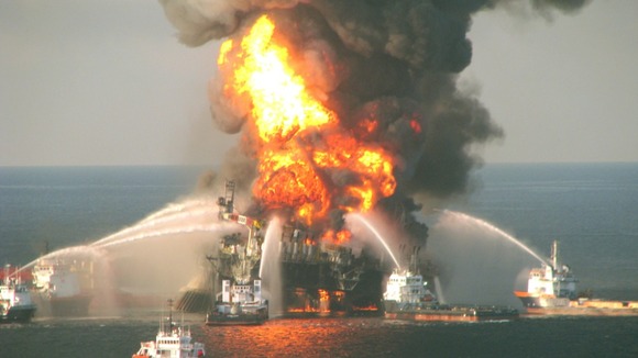 Fire boat response crews battle the blazing remnants of the off shore oil rig Deepwater Horizon.