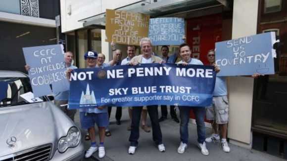 Coventry City fans protest outside the offices of SISU Capital in Red Place, London.