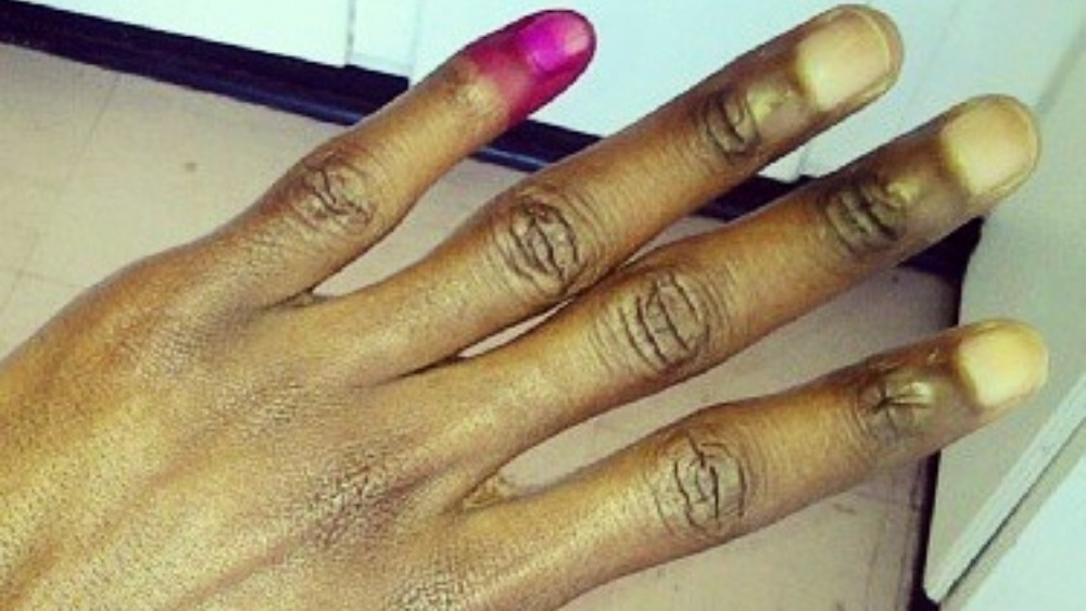 Zimbabweans show inkstained fingers after voting ITV News