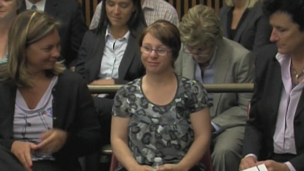 Michelle Knight smiles as Castro is led from court.