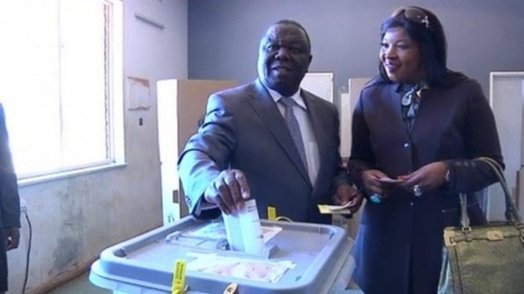 Prime Minister Morgan Tsvangirai casts his vote at yesterday's polls.